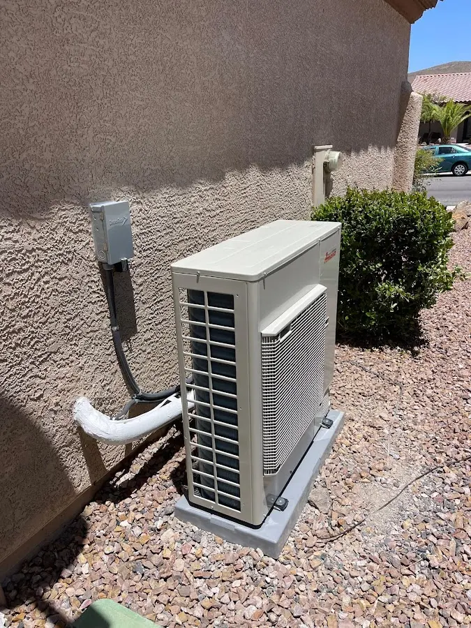 Residential air conditioning condenser unit in Osprey